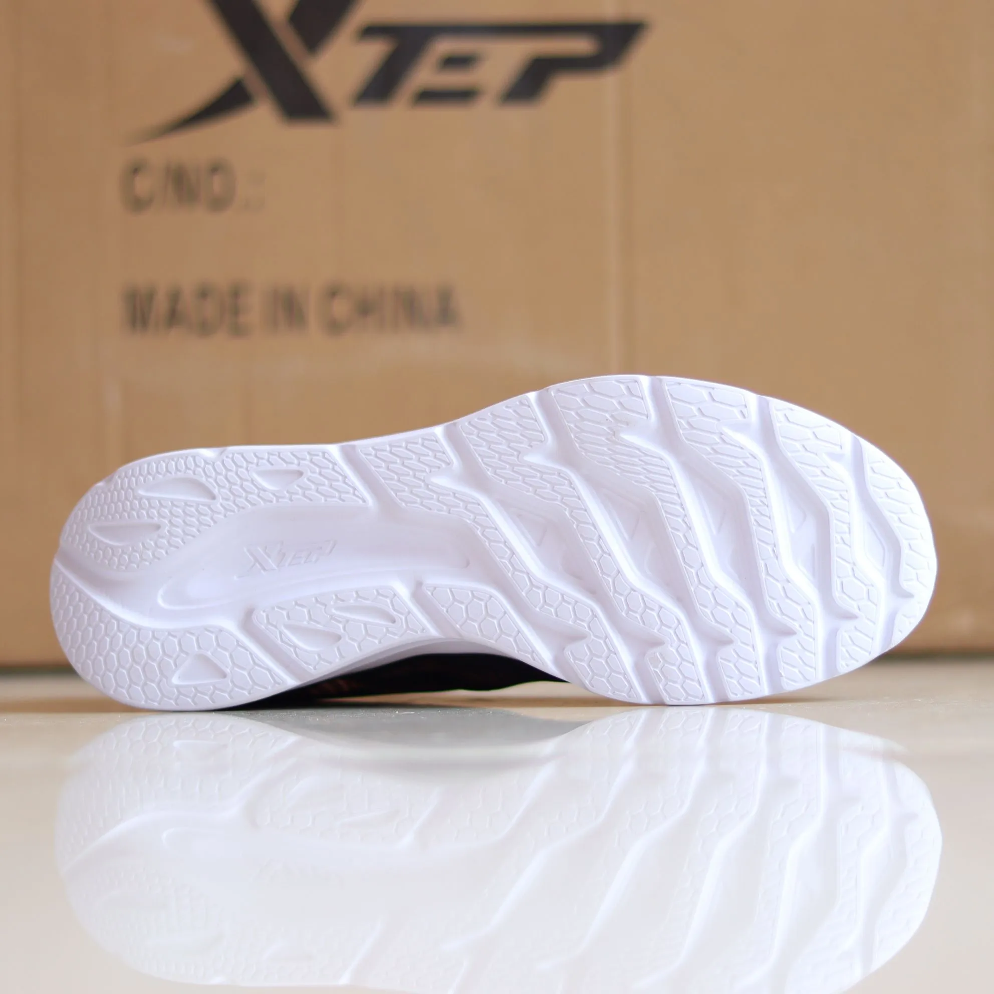 X52 - Women's Medicated Running Shoe by Xtep