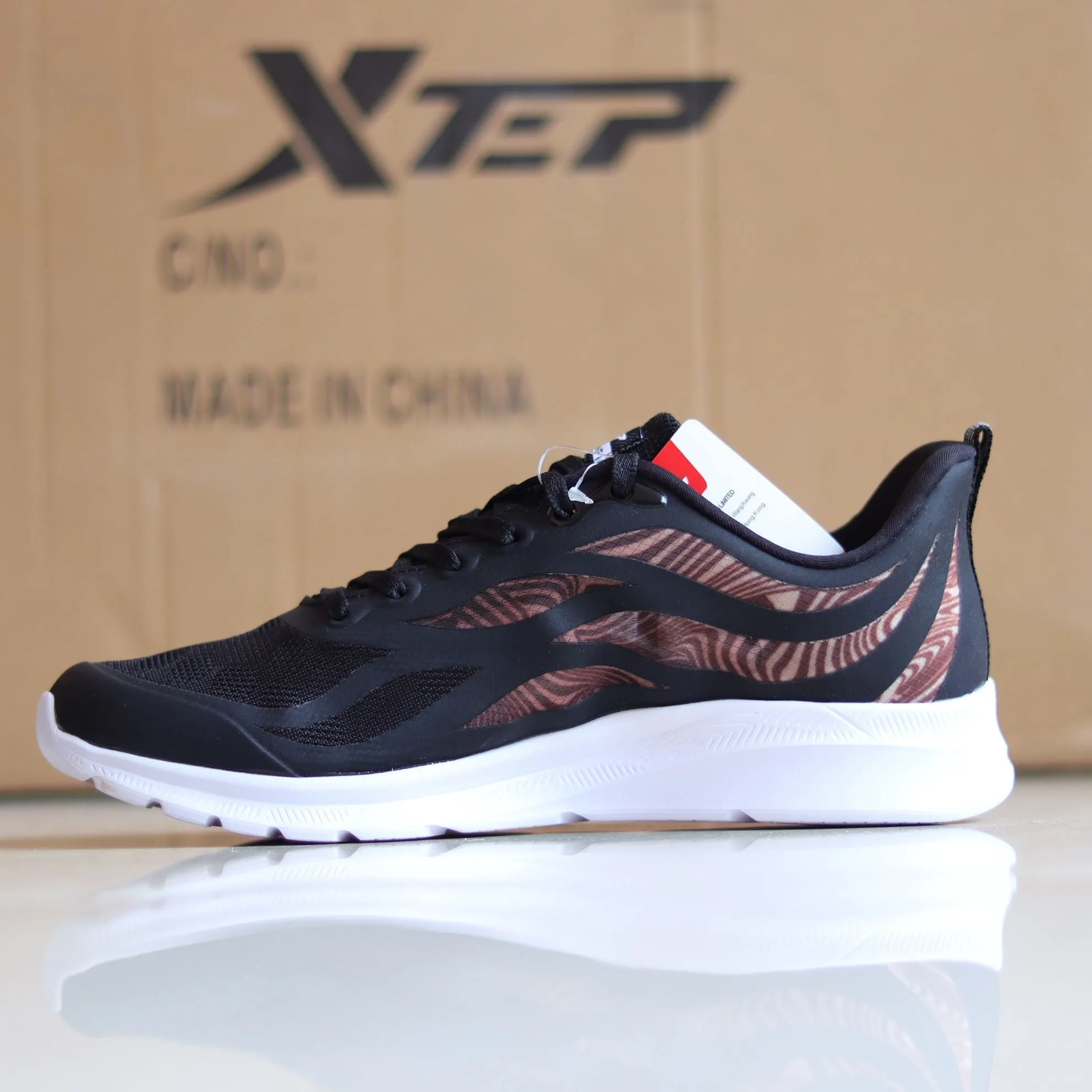 X52 - Women's Medicated Running Shoe by Xtep